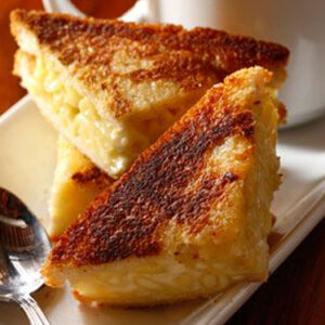 Three Mini Sandwiches Stacked on a Plate